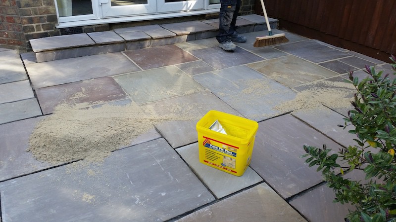 Pointing Indian Sandstone paving, North London
