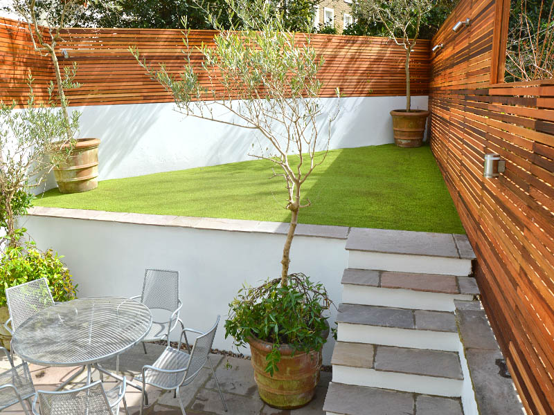 Red Cedar slated fencing and indian sandstone paving Camden, London